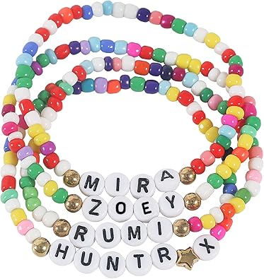 Set of Huntrix-inspired friendship bracelets featuring charms for Rumi, Mira, and Zoey from K-Pop Demon Hunters