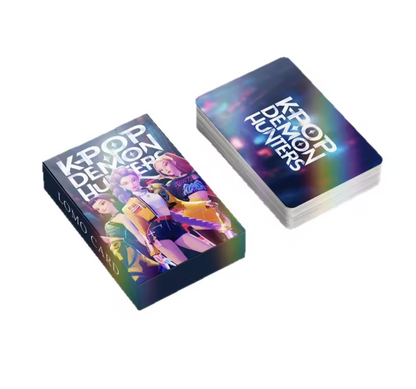 Detailed view of the back of the K-Pop Demon Hunters photocards featuring the official logo and holographic-style Soul Energy aesthetic